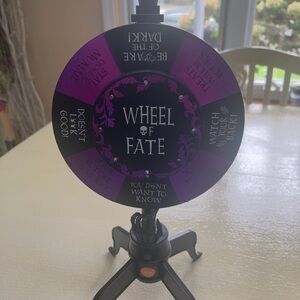 SOLD. 

Purple and Black Wheel of Fate Game